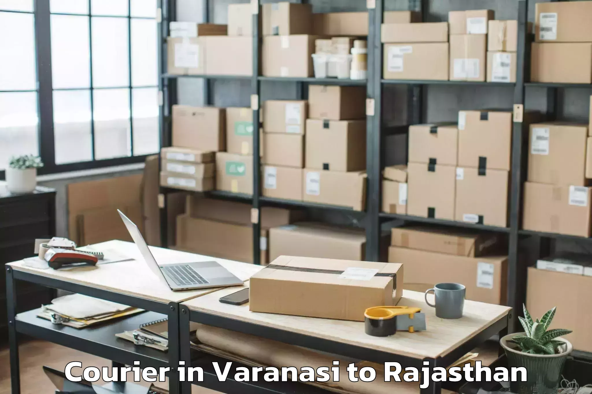 Book Varanasi to Singhania University Jhunjhunu Courier